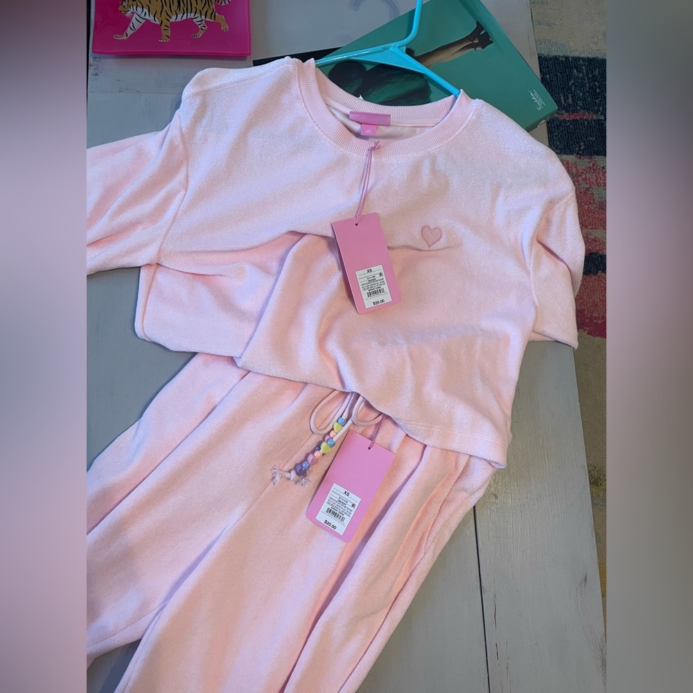 New with tags sold out Stoney clover set! Perfect to cover up after the pool